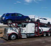 photo of cars on a car carrier trailer