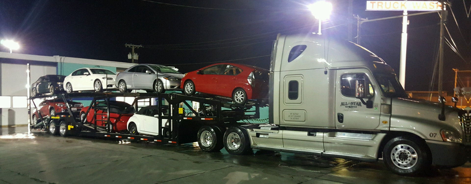 cars on a trailer truck